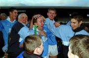 26 November 2000; Adrian Ronan of Graigue-Ballycallan, celebrates with supporters after his sides victory in the AIB Leinster Senior Hurling Championship Final between Graigue-Ballycallan and University College Dublin at Nowlan Park in Kilkenny. Photo by Ray McManus/Sportsfile