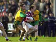 19 November 2000; James Nallen of Crossmolina in action against Aidan Donnellan of Corofin during the AIB Connacht Club Football Championship Final between Crossmolina and Corofin at St Tiernan's Park, Crossmolina in Mayo. Photo by Ray McManus/Sportsfile