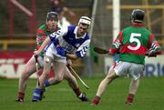 4 November 2000; Patrick Phelan of Castletown in action against Joe Errity, left, and John Paul O'Meara, (5), both of Birr, during the AIB Leinster Club Hurling Championship Quarter-Final match between Castletown and Birr at O'Moore Park in Portlaoise, Laois. Photo by Ray McManus/Sportsfile
