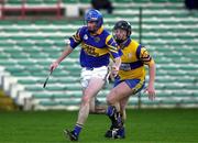 19 November 2000; Paul O'Grady of Patrickswell in action against Pat Hayes of Sixmilebridge during the AIB Munster Senior Hurling Club Championship Semi-Final match between Patrickswell and Sixmilebridge at the Gaelic Grounds in Limerick. Photo by Damien Eagers/Sportsfile