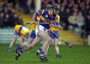 19 November 2000; Paul O'Reilly of Patrickswell in action against Brian Culbert of Sixmilebridge during the AIB Munster Senior Hurling Club Championship Semi-Final match between Patrickswell and Sixmilebridge at the Gaelic Grounds in Limerick. Photo by Damien Eagers/Sportsfile
