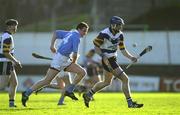 26 November 2000; Rory Moore of UCD in action against Tomas Dermody of Graigue-Ballycallan during the AIB Leinster Senior Hurling Championship Final between Graigue-Ballycallan and University College Dublin at Nowlan Park in Kilkenny. Photo by Ray McManus/Sportsfile