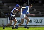 26 November 2000; Tomas Dermody of Graigue-Ballycallan is tackled by Colm Everard of UCD during the AIB Leinster Senior Hurling Championship Final between Graigue-Ballycallan and University College Dublin at Nowlan Park in Kilkenny. Photo by Ray McManus/Sportsfile