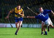 26 November 2000; John Reddan of Sixmilebridge in action against Keith O'Neill of Mount Sion during the AIB Munster Senior Hurling Club Championship Final match between Sixmilebridge and Mount Sion at Semple Stadium in Thurles, Tipperary. Photo by Ray Lohan/Sportsfile