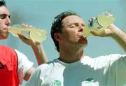 27 January 1999; Republic of Ireland Under-17 manager Brian Kerr, right, and John Thompson stay hydrated during a Republic of Ireland U-17 Squad Training Session at Greenpoint AFC in Capetown, South Africa. Photo by David Maher/Sportsfile