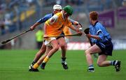 23 July 2000; Ciaran O'Grady of Antrim in action against Derek O'Reilly of Dublin during the All-Ireland Minor Hurling Championship Quarter-Final match between Dublin and Antrim at Croke Park in Dublin. Photo by Ray Lohan/Sportsfile