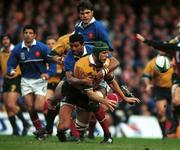 6 November 1999; Matt Cockbain of Australia in action against Emile N'Tamack of France during the Rugby World Cup Final match between Australia and France at the Millenium Stadium in Cardiff, Wales. Photo by Brendan Moran/Sportsfile