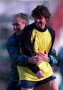 9 November 1996; Republic of Ireland manager Mick McCarthy, left, shares a joke with  Roy Keane during a Republic of Ireland training session at Lansdowne Road in Dublin. Photo by Ray McManus/Sportsfile