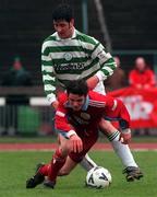 26 March 2000; Aubrey Dolan of Galway United is tackled by Graham Lawlor of Shamrock Rovers during the Eircom League Premier Division match between Shamrock Rovers and Galway United at Morton Stadium in Dublin. Photo by David Maher/Sportsfile