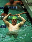 30 June 1999; Grant Wilson, Newtownabbey, Antrim, shows his delight at winning Silver for Ireland in his 25 meters backstroke at 1999 Special Olympics World Summer Games in Raleigh, North Carolina, USA. Photo by Ray McManus/Sportsfile