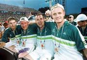 26 June 1999; Member of the Irish soccer team, from left, Colm Brennan from Waterford, Patrick Williams from Limerick, Michael Hehir, and Conor Hegarty from Cork pictured during the Opening Ceremony of the 1999 Special Olympics World Summer Games in Raleigh, North Carolina, USA. Photo by Ray McManus/Sportsfile