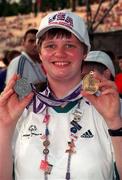 4 July 1999; Valerie Canning from Fermoy, Cork, shows her Bronze and Silver medals at the Closing Ceremony of the 1999 Special Olympics World Summer Games in Raleigh, North Carolina, USA. Photo by Ray McManus/Sportsfile