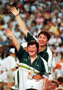 26 June 1999; Shauna Bradley, from Baltinglass, Wicklow, a member of the Irish Special Olympics Bowling team pictured with coach Maureen Brannock as they wave to supporters during the Opening Ceremony of the 1999 Special Olympics World Summer Games in Raleigh, North Carolina, USA. Photo by Ray McManus/Sportsfile
