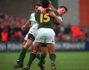 19 November 2000; Brian O'Driscoll of Ireland attempts to tackle Thinus Delport of South Africa during the International rugby friendly match between Ireland and South Africa at Lansdowne Road in Dublin. Photo by Ray Lohan/Sportsfile