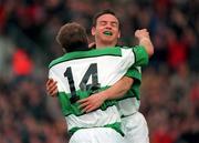 19 November 2000; Denis Hickie of Ireland, 14, celebrates after scoring a try with team-mate Rob Henderson during the International rugby friendly match between Ireland and South Africa at Lansdowne Road in Dublin. Photo by Aoife Rice/Sportsfile