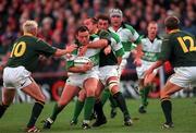 19 November 2000; Rob Henderson of Ireland is tackled by Corne Krige, centre, and Percy Montgomery, left, both of South Africa during the International rugby friendly match between Ireland and South Africa at Lansdowne Road in Dublin. Photo by Matt Browne/Sportsfile