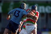 13 January 2001; Kelvin McNamee of Dective Rangers is tackled by Michael Colling of UCD during the AIB All-Ireland League Division 2 match between Bective Rangers and UCD at Donnybrook Stadium in Dublin. Photo By Brendan Moran/Sportsfile