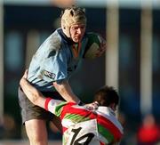 13 January 2001; Dermot O'Sullivan of UCD is tackled by James Hardy of Bective Rangers during the AIB All-Ireland League Division 2 match between Bective Rangers and UCD at Donnybrook Stadium in Dublin. Photo By Brendan Moran/Sportsfile