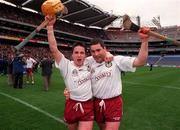 17 March 2000;  St Mary's Athenry players Brian Higgins, left, and Pascal Healy celebrate following the AIB All-Ireland Senior Club Hurling Championship Final match between Athenry and St Joseph's Doorabarefield at Croke Park in Dublin. Photo by Damien Eagers/Sportsfile