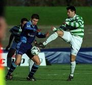 14 January 2001; Kevin Grogan of UCD is tackled Brian Byrne of UCD during the Eircom League Premier Division match between Shamrock Rovers and UCD at Morton Stadium in Santry, Dublin. Photo by Ray Lohan/Sportsfile
