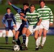 14 January 2001; Kevin Grogan of UCD in action against Shane Robinson of Shamrock Rovers during the Eircom League Premier Division match between Shamrock Rovers and UCD at Morton Stadium in Santry, Dublin. Photo by Ray Lohan/Sportsfile