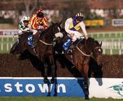 14 January 2001; Ross Moff, with Conor O'Dwyer up, left, clears the last along side Idiot's Star with John Cullen up, on their way to winning the Fitzpatrick Hotel Group Novice Chase during Horse Racing from Leopardstown Racecourse in Dublin. Photo By Brendan Moran/Sportsfile