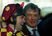 14 January 2001; Conor O'Dwyer, left, shares a joke with owner Seamus Ross after winning the Fitzpatrick Hotel Group Novice Steeplechase on Ross Moff during Horse Racing from Leopardstown Racecourse in Dublin. Photo By Brendan Moran/Sportsfile
