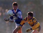14 January 2001; Noel Garvan of Laois in action against Brendan Burke of Longford during the O'Byrne Cup First Round match between Longford and Laois at Pearse Park in Longford. Photo by Aoife Rice/Sportsfile