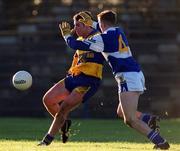14 January 2001; Alan Neilan of Longford in action against Joseph Higgins of Laois during the O'Byrne Cup First Round match between Longford and Laois at Pearse Park in Longford. Photo by Aoife Rice/Sportsfile