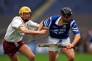 17 March 2000; Lorcan Hassett of St Joseph's Doorabarefield in action against Gerry Keane of St Mary's Athenry during the AIB All-Ireland Senior Club Hurling Championship Final match between Athenry and St Joseph's Doorabarefield at Croke Park in Dublin. Photo by Ray McManus/Sportsfile
