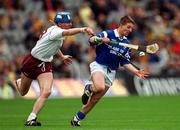 17 March 2000; Jamesie O'Connor of St Joseph's Doorabarefield in action against Brian Hanley of St Mary's Athenry during the AIB All-Ireland Senior Club Hurling Championship Final match between Athenry and St Joseph's Doorabarefield at Croke Park in Dublin. Photo by Ray McManus/Sportsfile