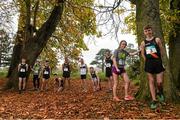 6 November 2015; Pictured at the GloHealth National Cross Country Championship Launch is John Travers, fourth from right, Donore Harriers, with athletes, from left, Alex Gibbons, Laura Power, Alex Hagan, Cathal Doyle, Sean Carrigg, Sean O'Leary, Thomas Ward, Jen Purcell and Daniel Lacey. Santry Demesne, Dublin. Picture credit: David Maher / SPORTSFILE