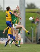 25 July 2009; Nigel Crawford, Meath, in action against Micael Finneran, Roscommon. GAA All-Ireland Senior Football Championship Qualifier, Round 3, Meath v Roscommon, Pa´irc Tailteann, Navan, Co. Meath. Picture credit: Pat Murphy / SPORTSFILE