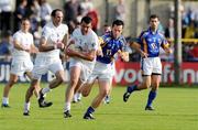 25 July 2009; Padraig O'Neill, Kildare, in action against Brian McGrath, Wicklow. GAA All-Ireland Senior Football Championship Qualifier, Round 4, Kildare v Wicklow, O'Moore Park, Portlaoise, Co. Laois. Picture credit: Matt Browne / SPORTSFILE