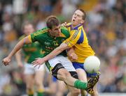 25 July 2009; Brian Farrell, Meath, in action against Sean McDermott, Roscommon. GAA All-Ireland Senior Football Championship Qualifier, Round 3, Meath v Roscommon, Pa´irc Tailteann, Navan, Co. Meath. Picture credit: Pat Murphy / SPORTSFILE