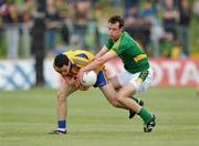 25 July 2009; David O'Gara, Roscommon, in action against Cormac McGuinness, Meath. GAA All-Ireland Senior Football Championship Qualifier, Round 3, Meath v Roscommon, Pa´irc Tailteann, Navan, Co. Meath. Picture credit: Pat Murphy / SPORTSFILE