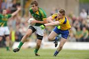 25 July 2009; Brian Farrell, Meath, in action against Peter Domican, Roscommon. GAA All-Ireland Senior Football Championship Qualifier, Round 3, Meath v Roscommon, Pa´irc Tailteann, Navan, Co. Meath. Picture credit: Pat Murphy / SPORTSFILE