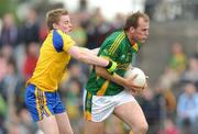 25 July 2009; Joe Sheridan, Meath, in action against Peter Domican, Roscommon. GAA All-Ireland Senior Football Championship Qualifier, Round 3, Meath v Roscommon, Pa´irc Tailteann, Navan, Co. Meath. Picture credit: Pat Murphy / SPORTSFILE