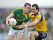 25 July 2009; Nigel Crawford, Meath, in action against Senan Kilbride, Roscommon. GAA All-Ireland Senior Football Championship Qualifier, Round 3, Meath v Roscommon, Pa´irc Tailteann, Navan, Co. Meath. Picture credit: Pat Murphy / SPORTSFILE