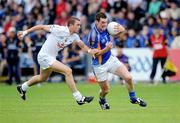 25 July 2009; Thomas Walsh, Wicklow, in action against Daryl Flynn, Kildare. GAA All-Ireland Senior Football Championship Qualifier, Round 4, Kildare v Wicklow, O'Moore Park, Portlaoise, Co. Laois. Picture credit: Matt Browne / SPORTSFILE