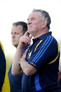 25 July 2009; Clare manager Mike McNamara watches his teams in action against Wexford. GAA Hurling All-Ireland Senior Championship Relegation, Round 1, Clare v Wexford, O'Moore Park, Portlaoise, Co. Laois. Picture credit: Matt Browne / SPORTSFILE