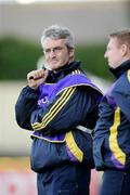 25 July 2009; Wexford manager Colm Bonnar watches his players in action against Clare. GAA Hurling All-Ireland Senior Championship Relegation, Round 1, Clare v Wexford, O'Moore Park, Portlaoise, Co. Laois. Picture credit: Matt Browne / SPORTSFILE