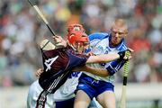 26 July 2009; Ollie Canning, Galway, in action against John Mullane, Waterford. GAA All-Ireland Senior Hurling Championship Quarter-Final, Galway v Waterford, Semple Stadium, Thurles, Co. Tipperary. Picture credit: Ray McManus / SPORTSFILE