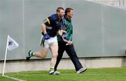 26 July 2009; Kerry's Tomas O Se runs out onto the pitch alongside manager Jack O'Connor. GAA All-Ireland Senior Football Championship Qualifier Round 4, Antrim v Kerry, O'Connor Park, Tullamore, Co. Offaly. Picture credit: Brendan Moran / SPORTSFILE