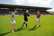 19 July 2009; Referee John Bannon, Longford, in the company of Mayo captain Trevor Mortimer, left, greets the Galway captain Damien Burke. GAA Football Connacht Senior Championship Final, Galway v Mayo, Pearse Stadium, Salthill, Galway. Picture credit: Ray McManus / SPORTSFILE