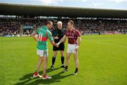 19 July 2009; The Mayo and Galway captains, Trevor Mortimer and Damien Burke, greet each other in the company of match referee John Bannon. Football Connacht Senior Championship Final, Galway v Mayo, Pearse Stadium, Salthill, Galway. Picture credit: Ray McManus / SPORTSFILE