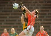 26 July 2009; Dervla Mallon, Armagh, in action against Jenny Rispin, Meath. TG4 All-Ireland Ladies Football Senior Championship Qualifier, Round 1, Armagh v Meath, Kingspan Breffni Park, Cavan. Picture credit: Pat Murphy / SPORTSFILE
