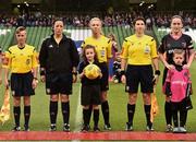 8 November 2015; Ball-carrier Ella Lambert, age 7 from Wexford town, holding the match ball with referee Paula Brady with her assistatants, Michelle O'Neill, Natasha Valentini and Deirdre Nolan at the Continental Tyres FAI Women's Senior Cup Final between Wexford Youths WAFC and Shelbourne Ladies FC. Aviva Stadium, Lansdowne Road, Dublin. Picture credit: David Maher / SPORTSFILE
