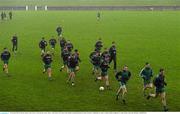 8 November 2015; St Patrick's players come in after a warm up after a heavy shower. AIB Leinster GAA Senior Club Football Championship Quarter-Final, St Patrick's v Ballyboden St. Enda's. County Grounds, Drogheda, Co. Louth. Picture credit: Ray McManus / SPORTSFILE