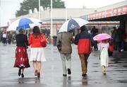 28 July 2009; Punters arrive ahead of the second day of the Galway Racing Festival. Ballybrit, Galway. Picture credit: Stephen McCarthy / SPORTSFILE